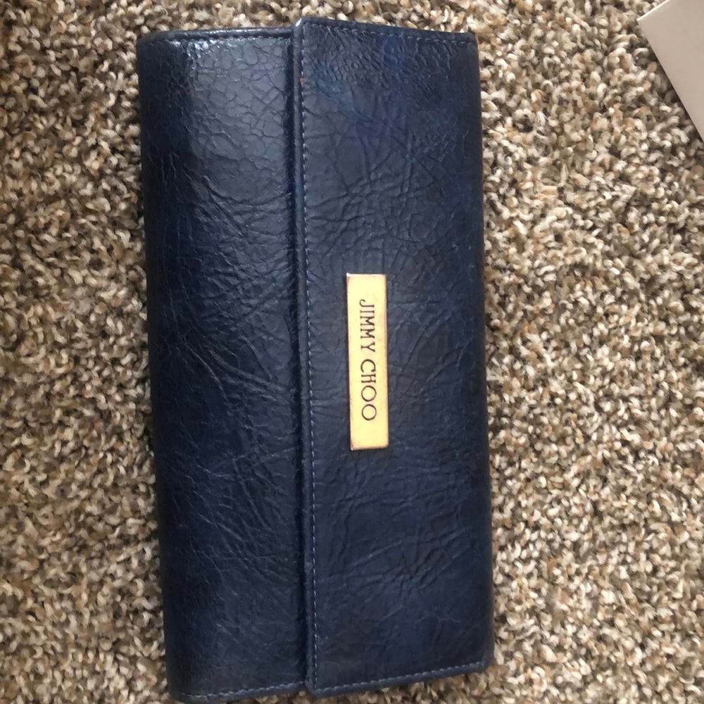 A blue leather jimmy choo wallet